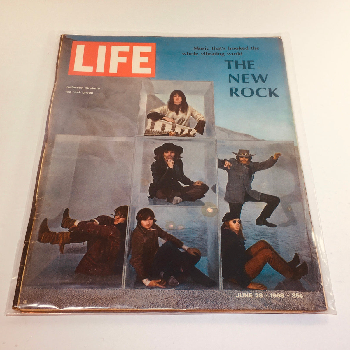 Vintage Life Magazine from June 28, 1968, featuring Jefferson Airplane as the new rock sensation, showcasing a group of musicians in an artistic arrangement.