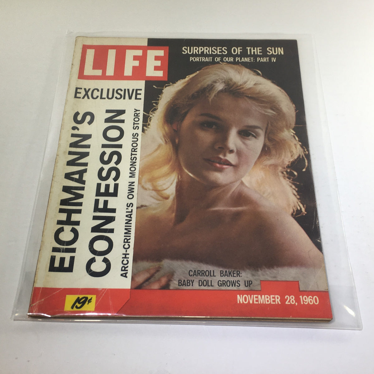 Vintage Life Magazine cover from November 28, 1960 featuring Carroll Baker with the title 'Baby Doll Grows Up', showcasing 1960s glamour.