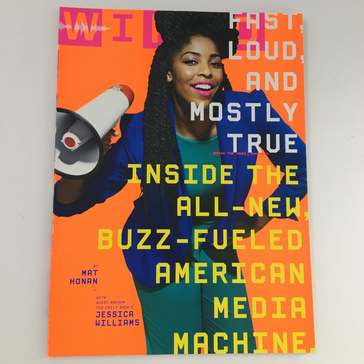 Cover of Wired Magazine January 2015 featuring The Daily Show's Jessica Williams, showcasing vibrant colors with the headline 'Fast, Loud, and Mostly True: Inside the All-New, Buzz-Fueled American Media Machine'.