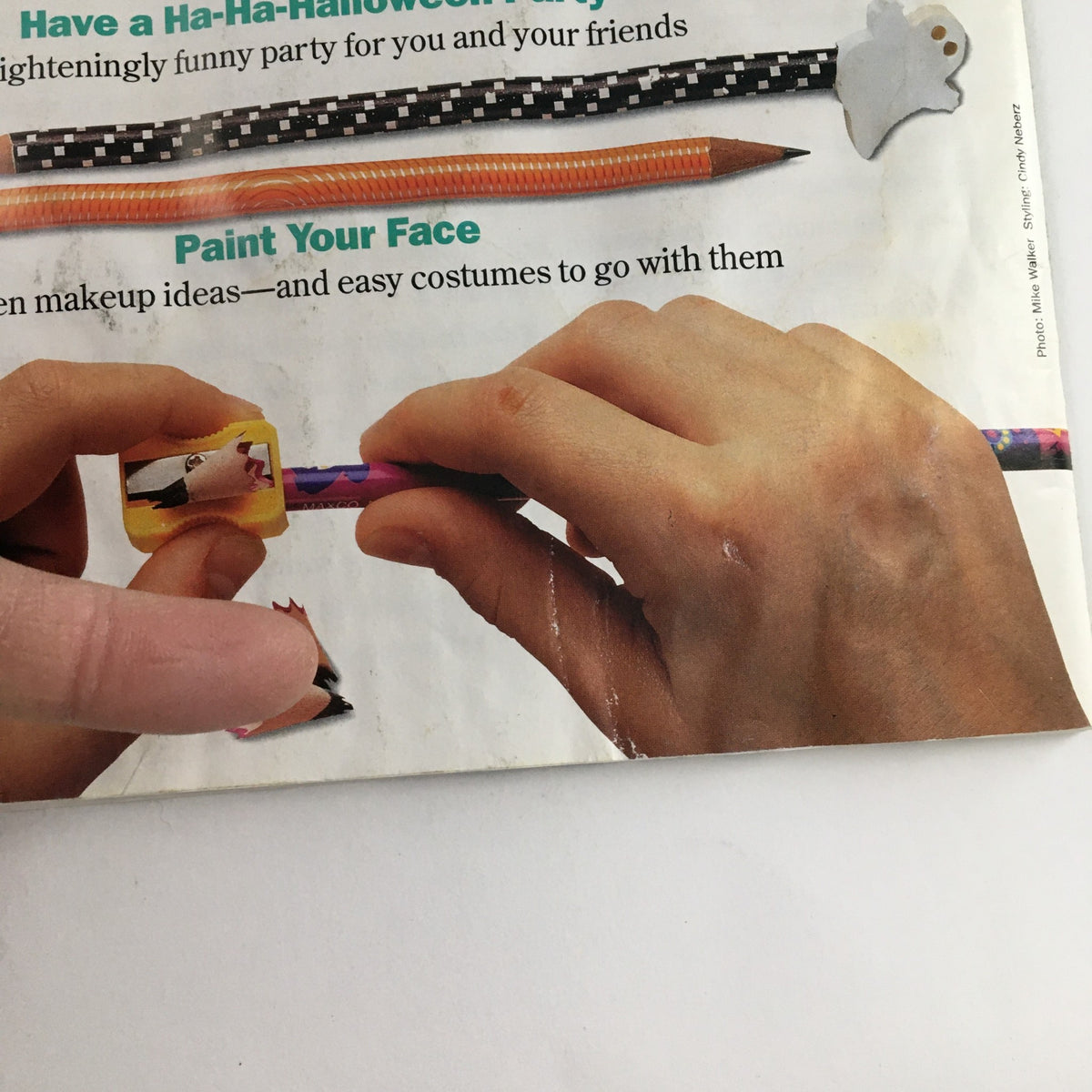 Close-up of American Girl Magazine July August 1997 Coast-to-Coast Summer Fun Feature, highlighting a Halloween makeup idea and pencil sharpening activity.