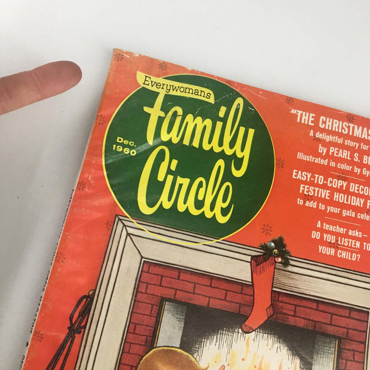 Close-up of the header of VTG Family Circle Magazine December 1960, highlighting 'The Christmas Ghost' story, showcasing the vintage magazine's logo and festive design.