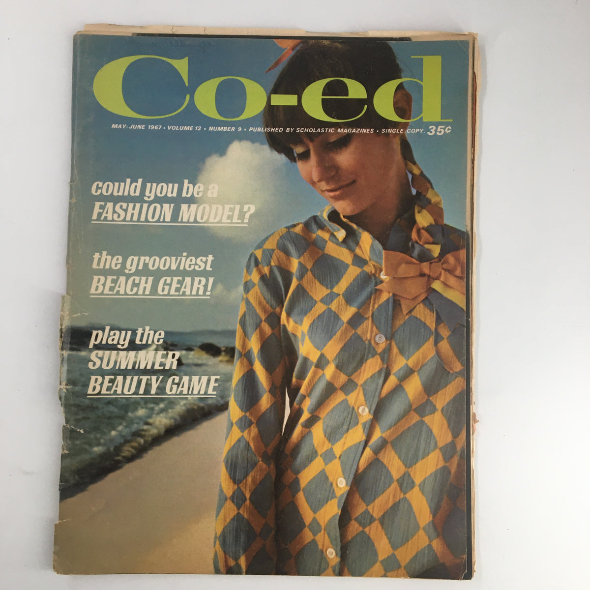 VTG Co-Ed Magazine May 1967 Play The Summer Beauty Game No Label - Cover featuring a young woman in a patterned shirt on a beach.
