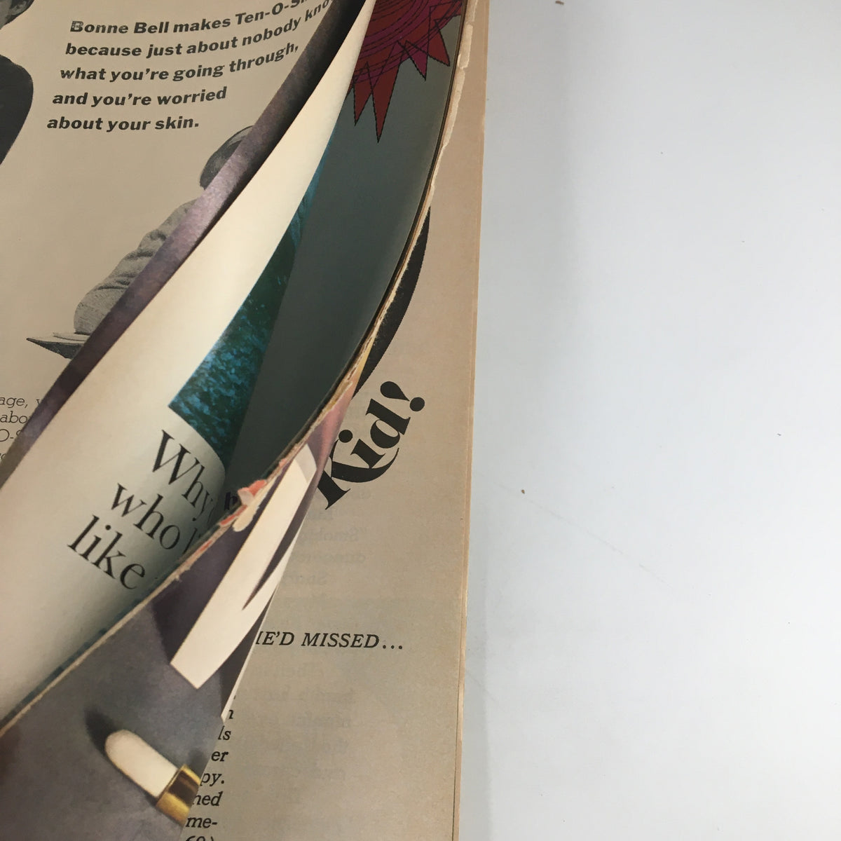 Close-up view of the VTG Co-Ed Magazine from May 1967 featuring the title 'Play The Summer Beauty Game.' The image shows the magazine's pages, highlighting some wear and a protective covering, indicative of its vintage condition.