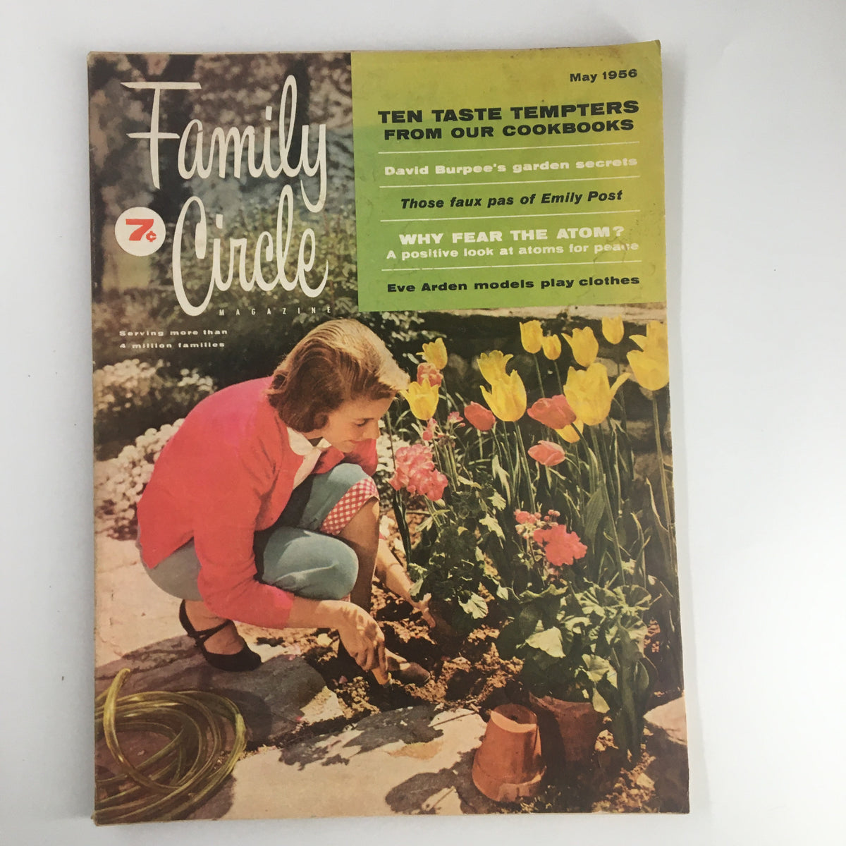 Cover of VTG Family Circle Magazine from May 1956 featuring the article 'Those Faux Pas of Emily Post', showcasing a woman in a garden surrounded by flowers and gardening tools.