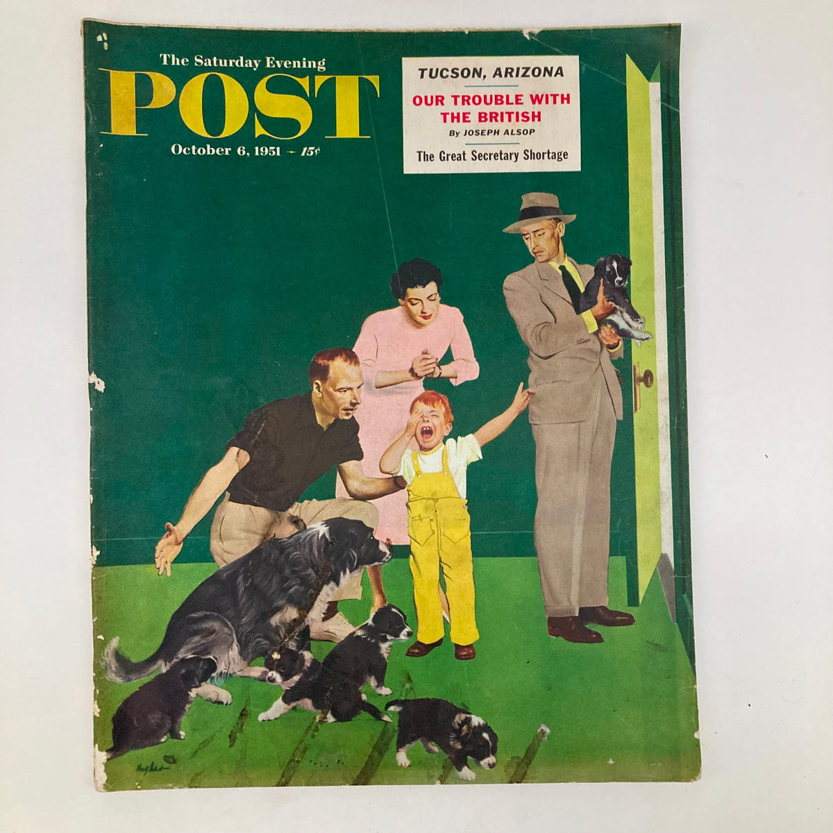 Cover of Saturday Evening Post Magazine, October 6, 1951, featuring an illustrated scene of a family reacting to playful puppies on a green background, illustrating mid-20th century American life.