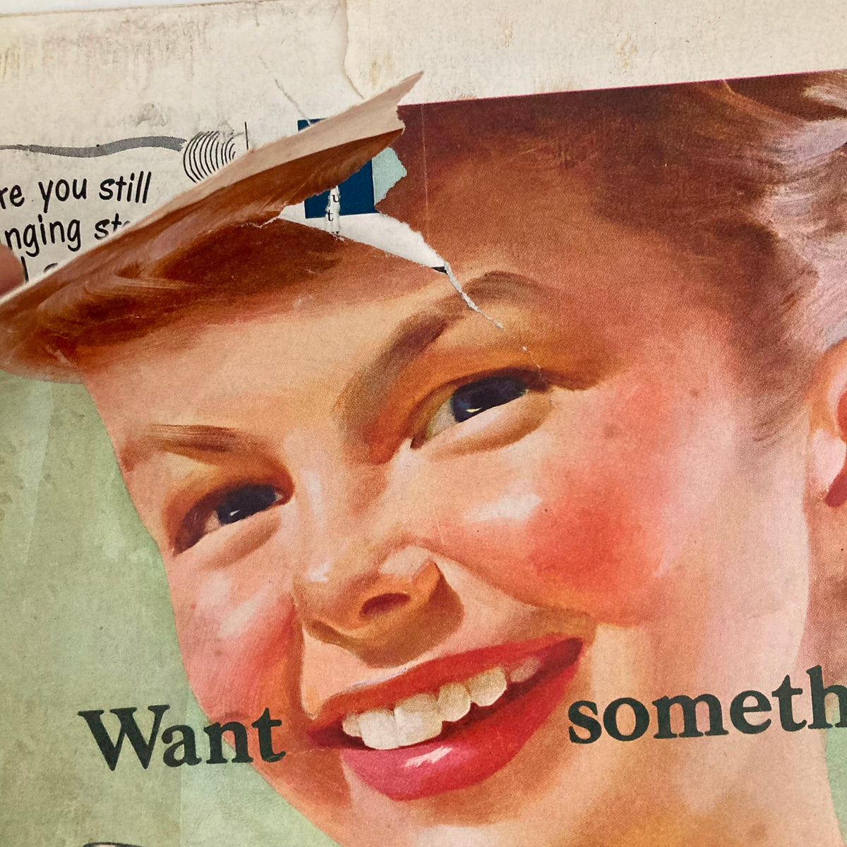 Close-up view of the Coca-Cola advertisement from Saturday Evening Post Magazine October 6 1951, highlighting the smiling girl's face and the playful text 'Want something good?' showcasing classic vintage branding.