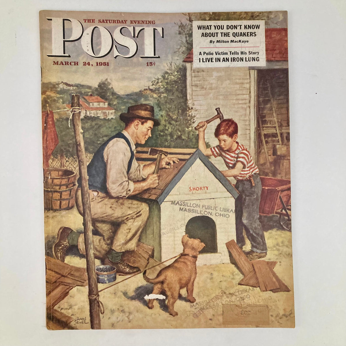 Cover of the Saturday Evening Post Magazine from March 24, 1951, featuring an illustrated scene by Amos Sewell, depicting a man and a boy building a doghouse with a puppy nearby.