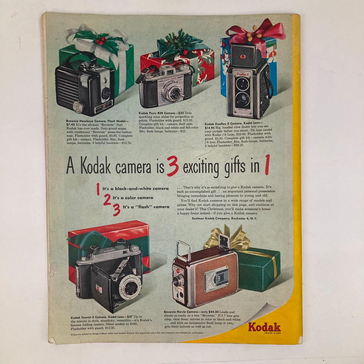 Vintage advertisement in Saturday Evening Post Magazine December 8 1951 promoting Kodak cameras as exciting gifts for the holiday season, illustrating three different models.