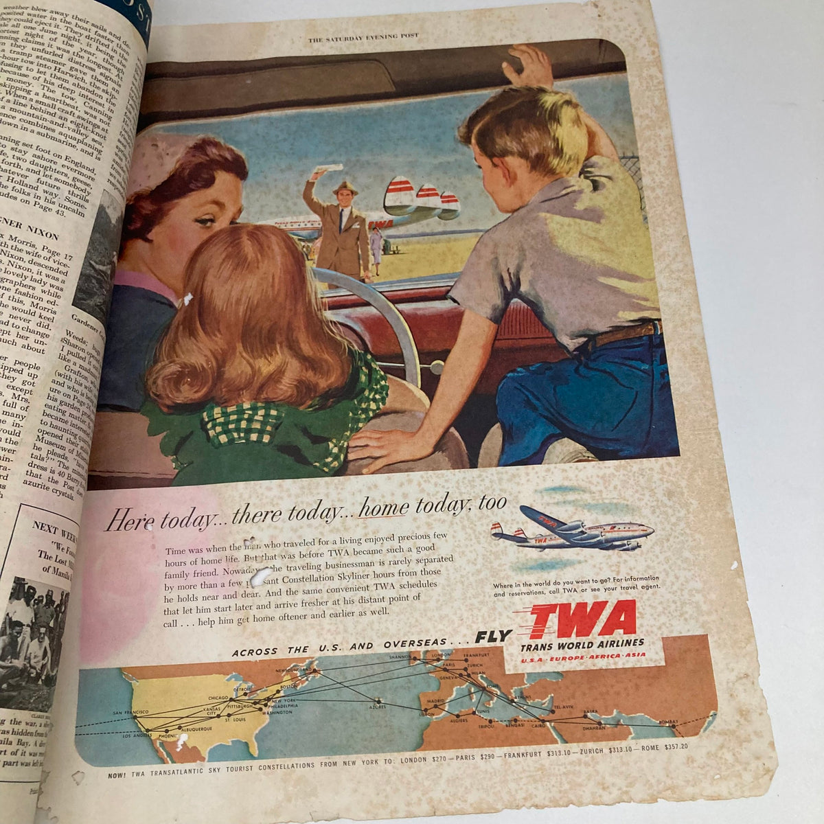 Charming scene of a family in a car with children looking out at an airport, promoting TWA Airlines in the Saturday Evening Post Magazine September 6 1952 Traffic Cop - George Hughes.