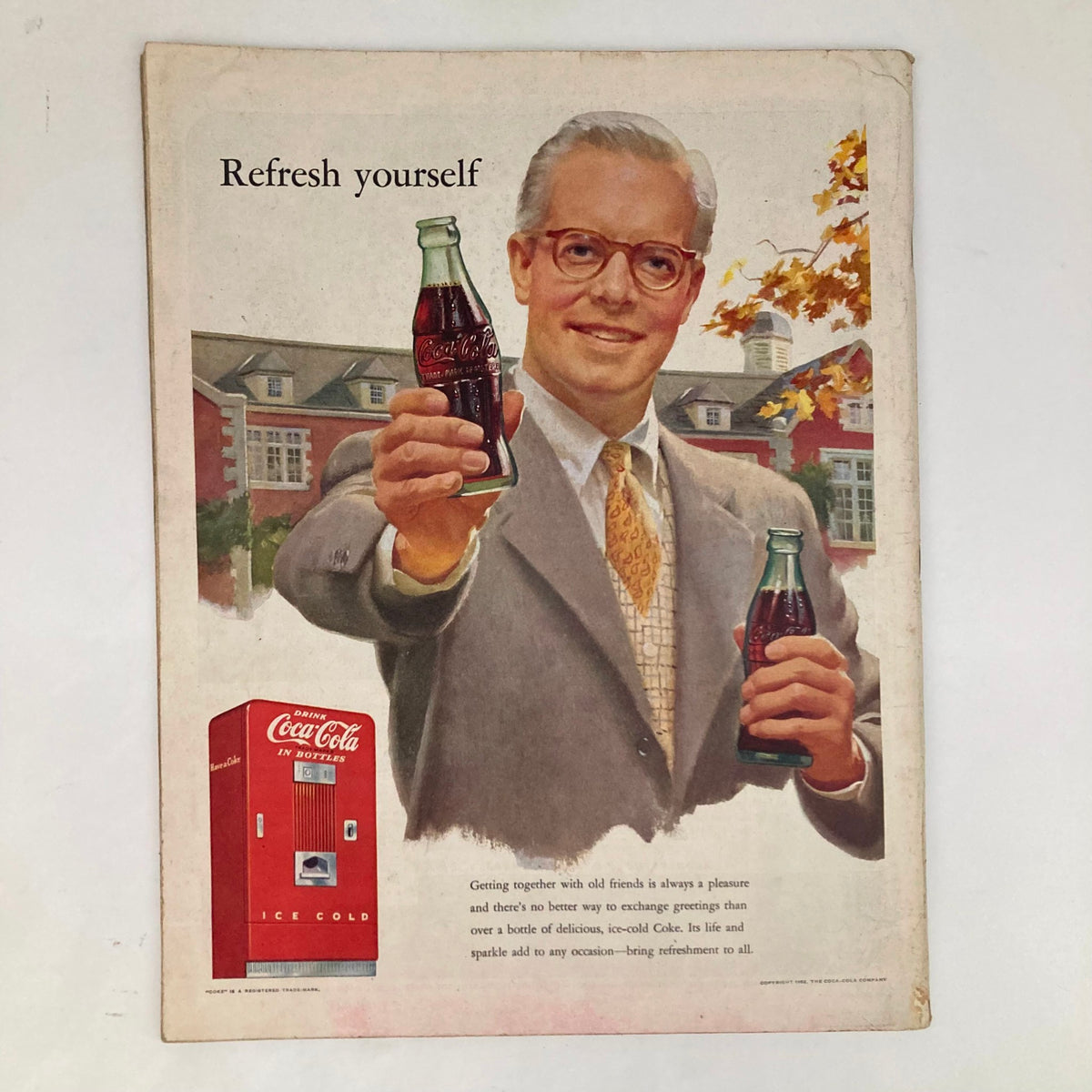 Back cover of Saturday Evening Post Magazine September 6 1952 featuring a vintage Coca-Cola advertisement, displaying a man cheerfully holding two Coca-Cola bottles.