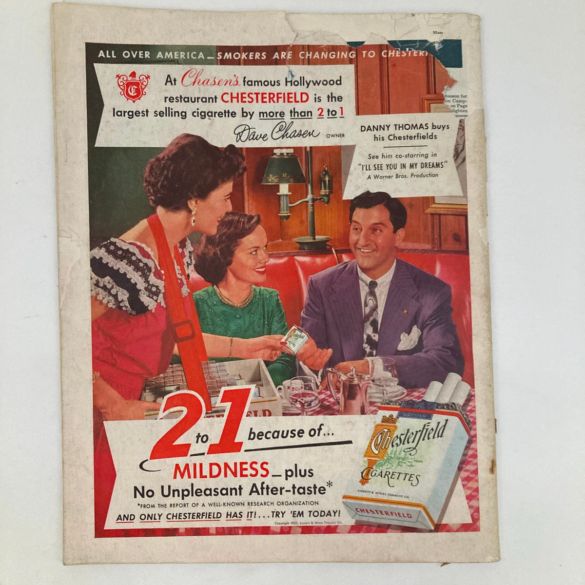 Cover of Saturday Evening Post Magazine March 8 1952 showcasing an advertisement for Chesterfield cigarettes, featuring three people in a cafe setting, representing vintage advertising style.