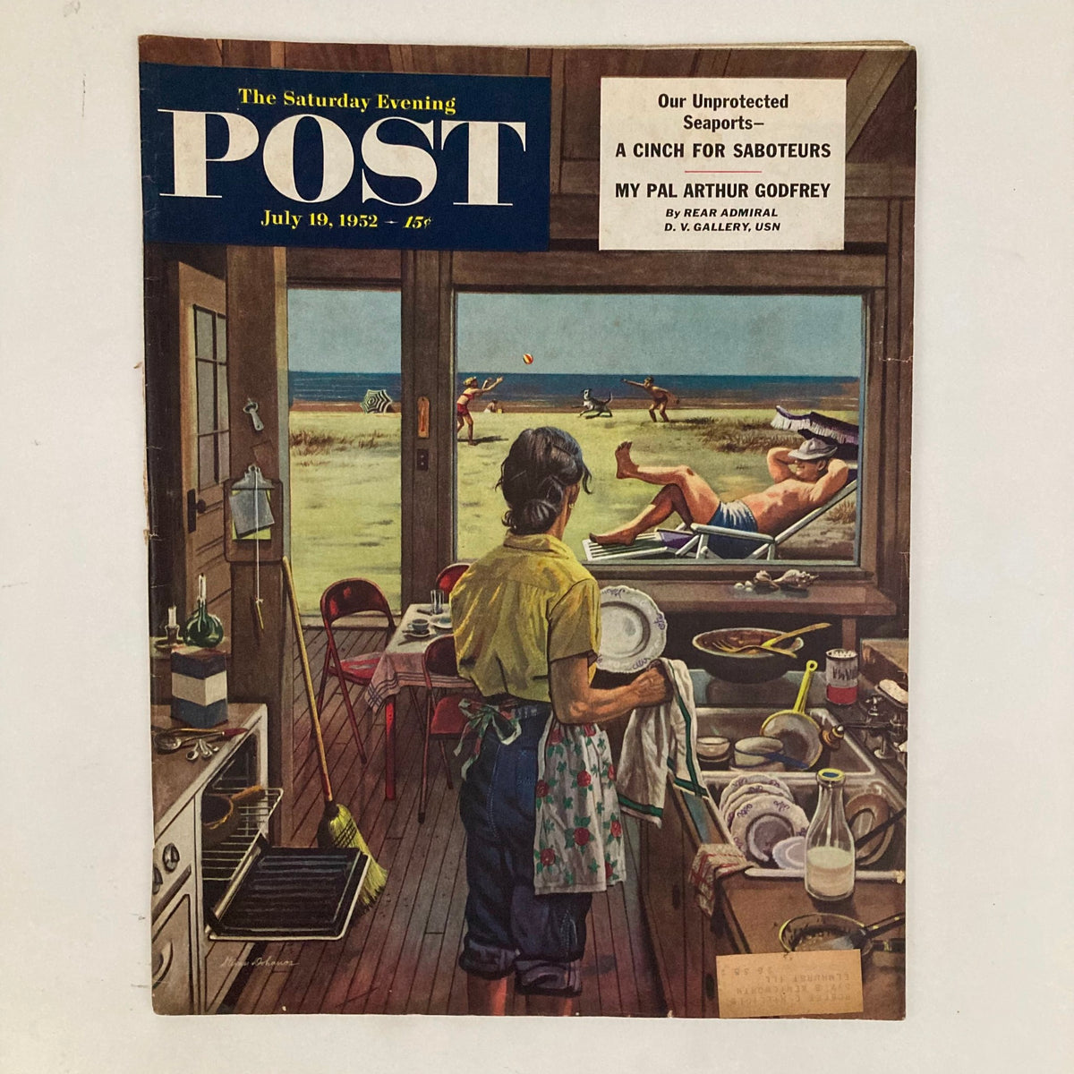 Cover of Saturday Evening Post Magazine July 19, 1952 featuring a woman in a kitchen looking out at a beach scene, titled 'A Vacation' by Stevan Dohanos.