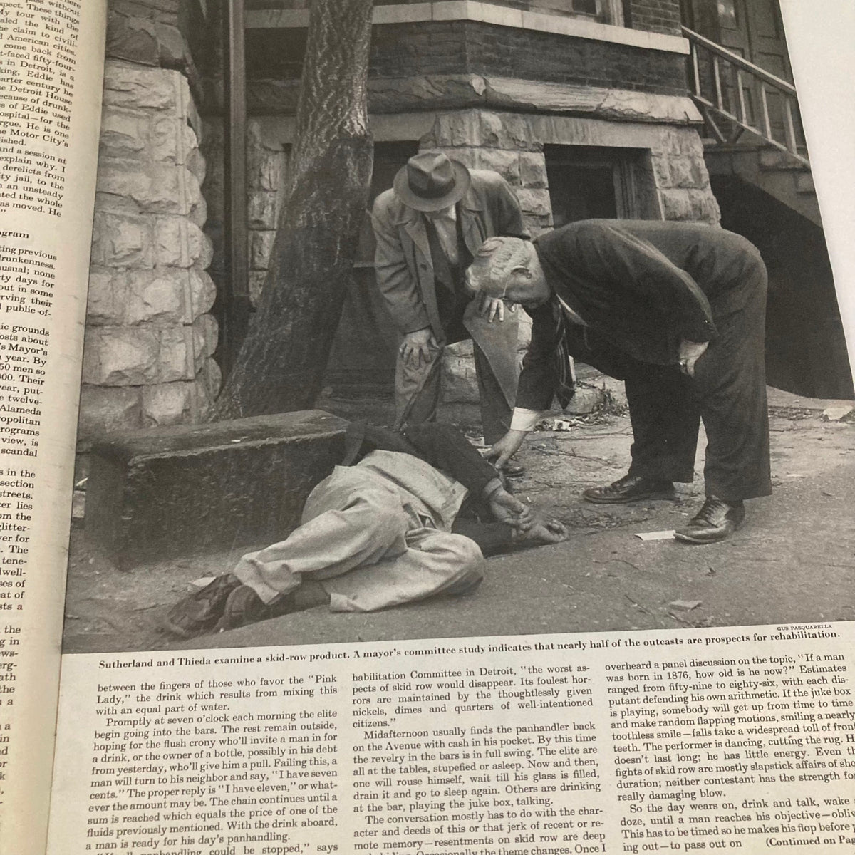 A black and white image in the Saturday Evening Post Magazine from December 20, 1952, illustrating a serious moment where two individuals are examining someone lying on the ground.