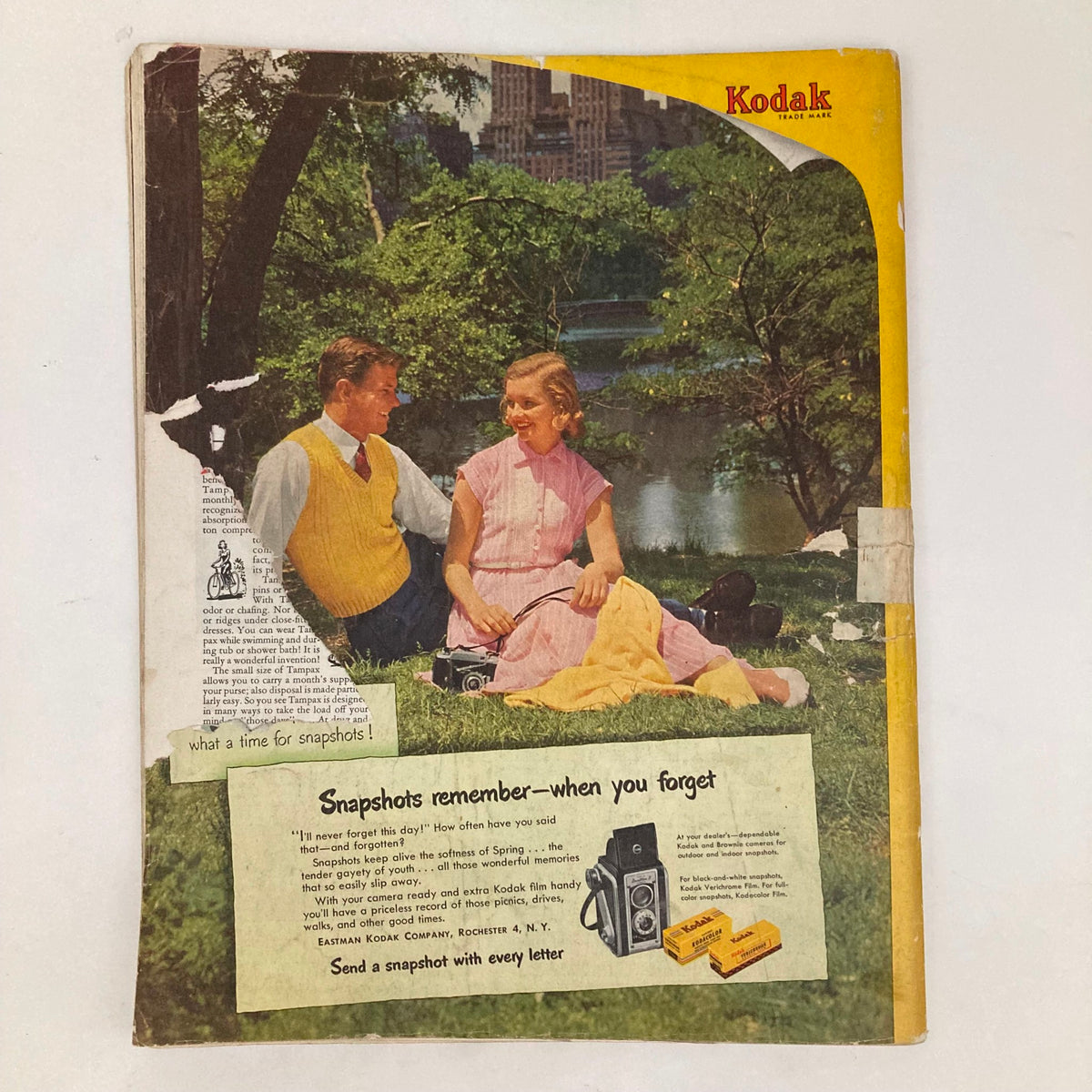 Cover of the Saturday Evening Post April 12 1952 featuring a nostalgic Kodak advertisement with a couple enjoying a spring day, promoting snapshot photography.