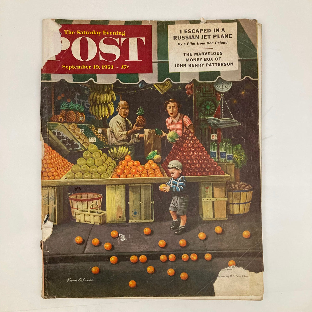 Cover of the Saturday Evening Post Magazine from September 19, 1953 featuring a vibrant fruit stand illustrated by Stevan Dohanos. A boy is seen playing with oranges in front of the market.