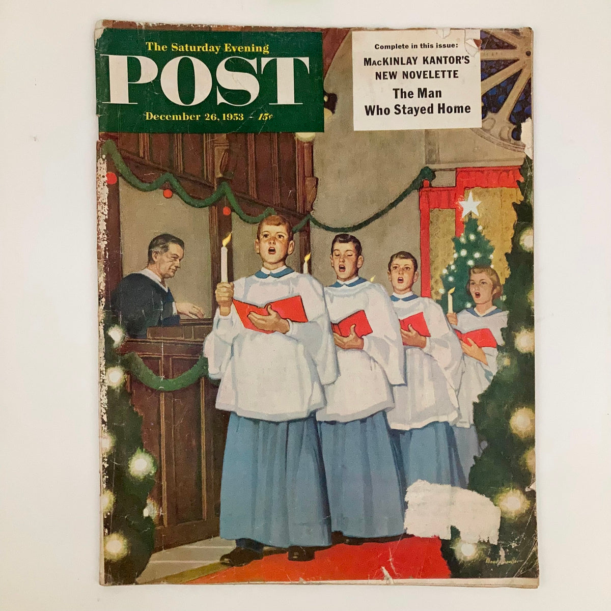 Cover of Saturday Evening Post Magazine December 26 1953 Christmas - Schaeffer, featuring choir boys singing in church with Christmas decorations.