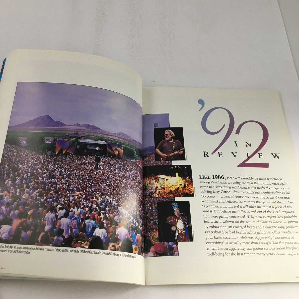 Inside view of The Golden Road Issue 27 1993 Annual Deadheads Tour & Jerry Garcia Emergency showcasing a large audience at a music festival with Jerry Garcia performing.