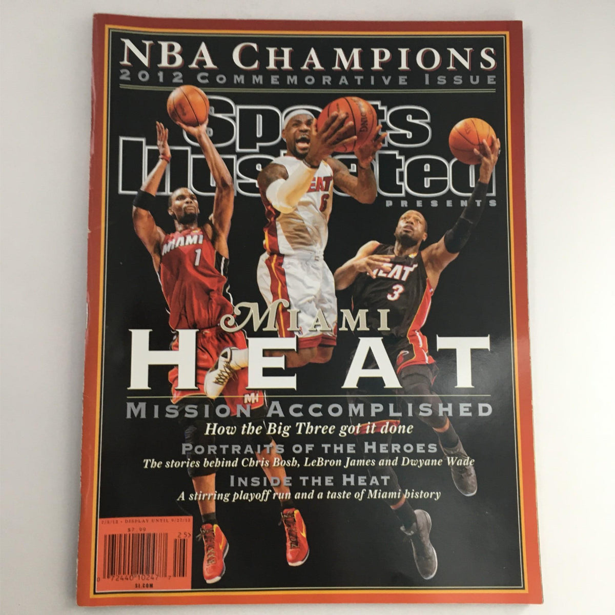 Sports Illustrated Magazine 2012 NBA Champions Miami Heat featuring LeBron James on the cover, celebrating the team's championship victory with images of the players and title information.