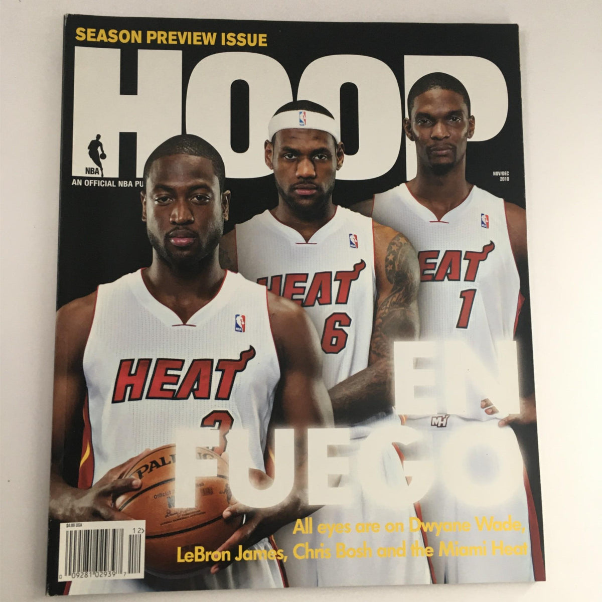 Hood Magazine Nov/Dec 2010 featuring Miami Heat stars LeBron James, Dwyane Wade, and Chris Bosh on the cover with the title 'EN FUEGO'. A must-have collectible for basketball fans and memorabilia collectors.