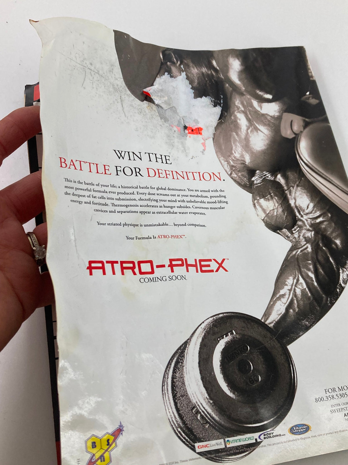 Back cover of Flex Magazine September 2006 with visible damage, promoting ATRO-PHEX and information about dietary supplements.