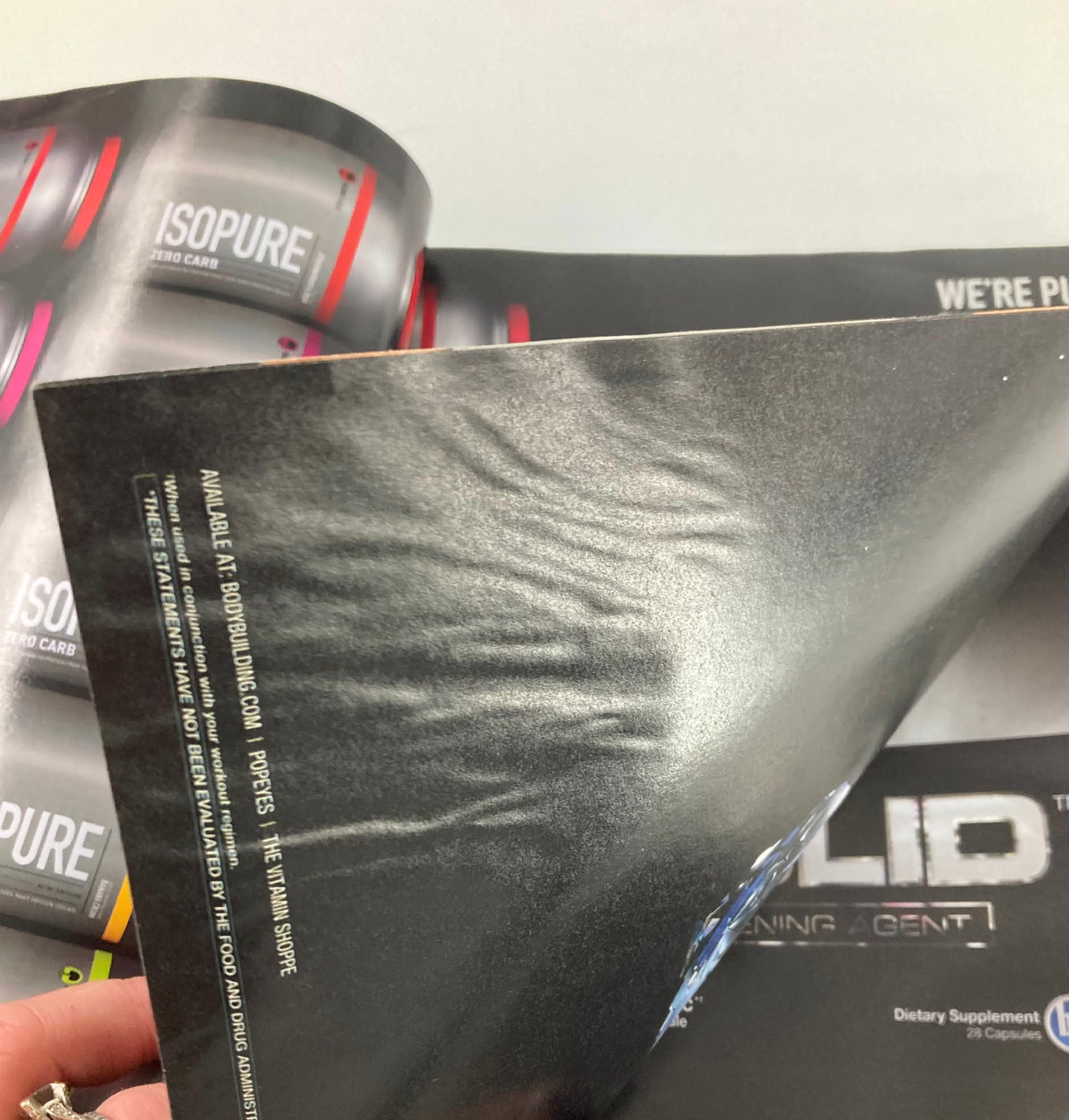 Interior of Flex Magazine September 2011 Vol 29 #7 showing promotional page for Isopure products, highlighting fitness and nutrition.