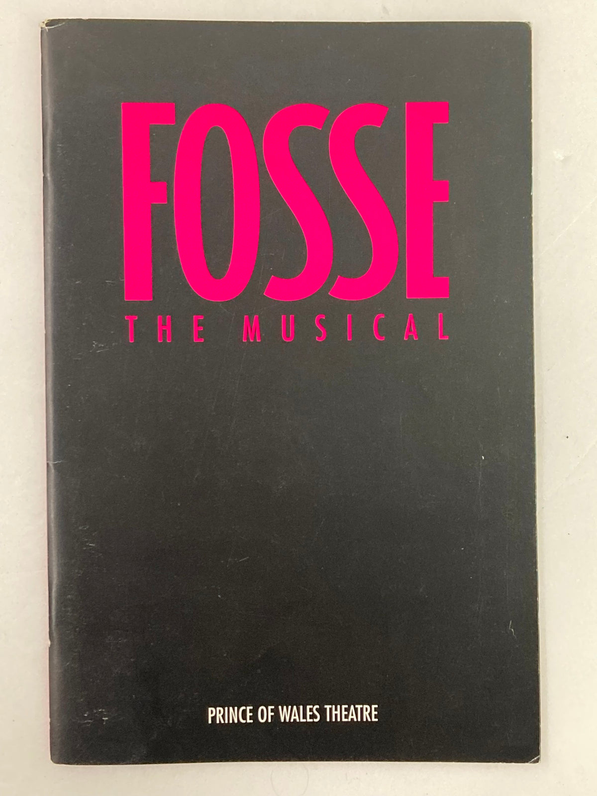 Fosse The Musical 2000 Playbill cover from the Prince of Wales Theatre, featuring bold pink typography on a black background.