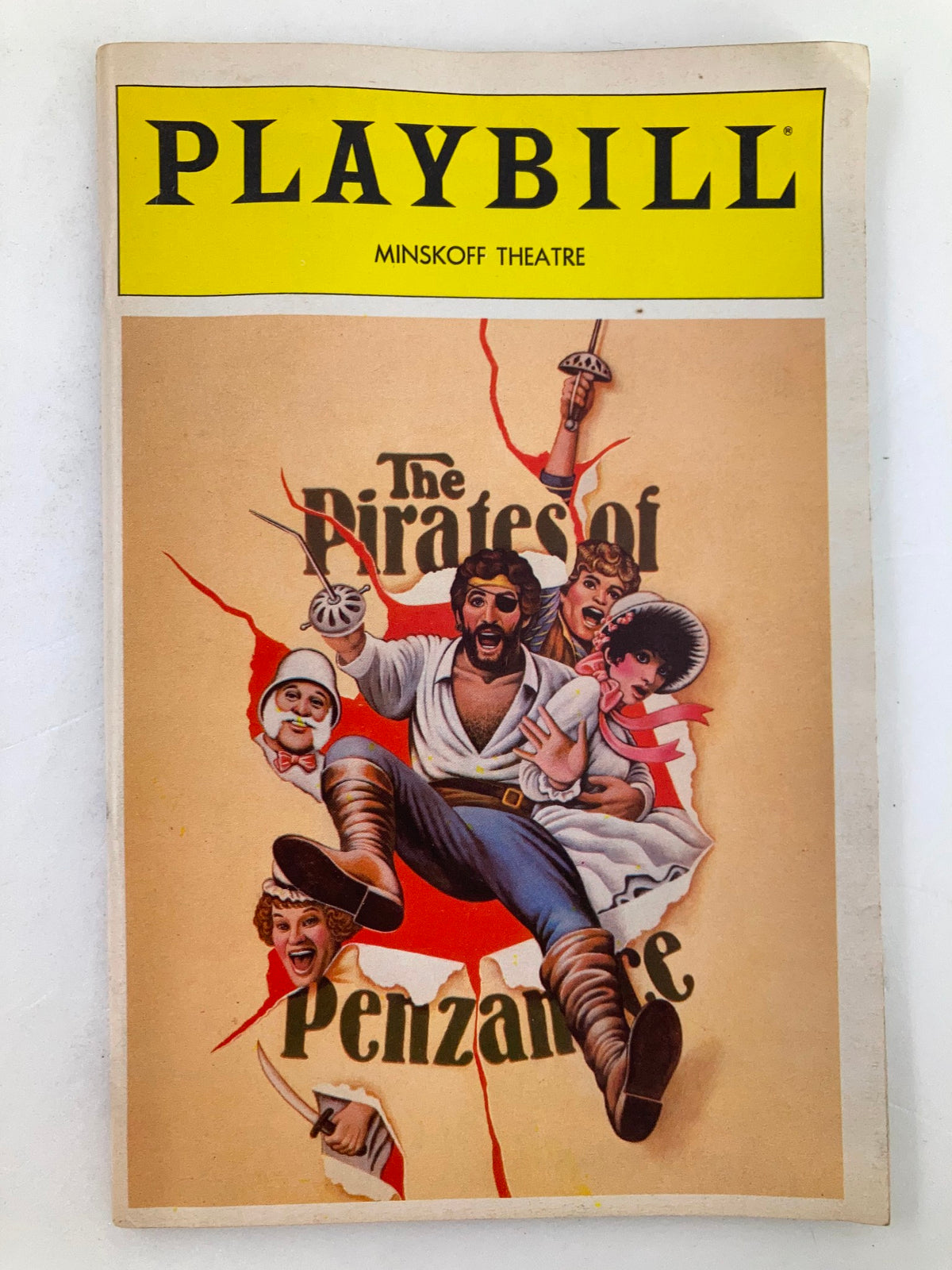 Cover of the 1982 Playbill from Minskoff Theatre featuring Kaye Ballard in The Pirates of Penzance, showcasing vibrant artwork of characters in action.