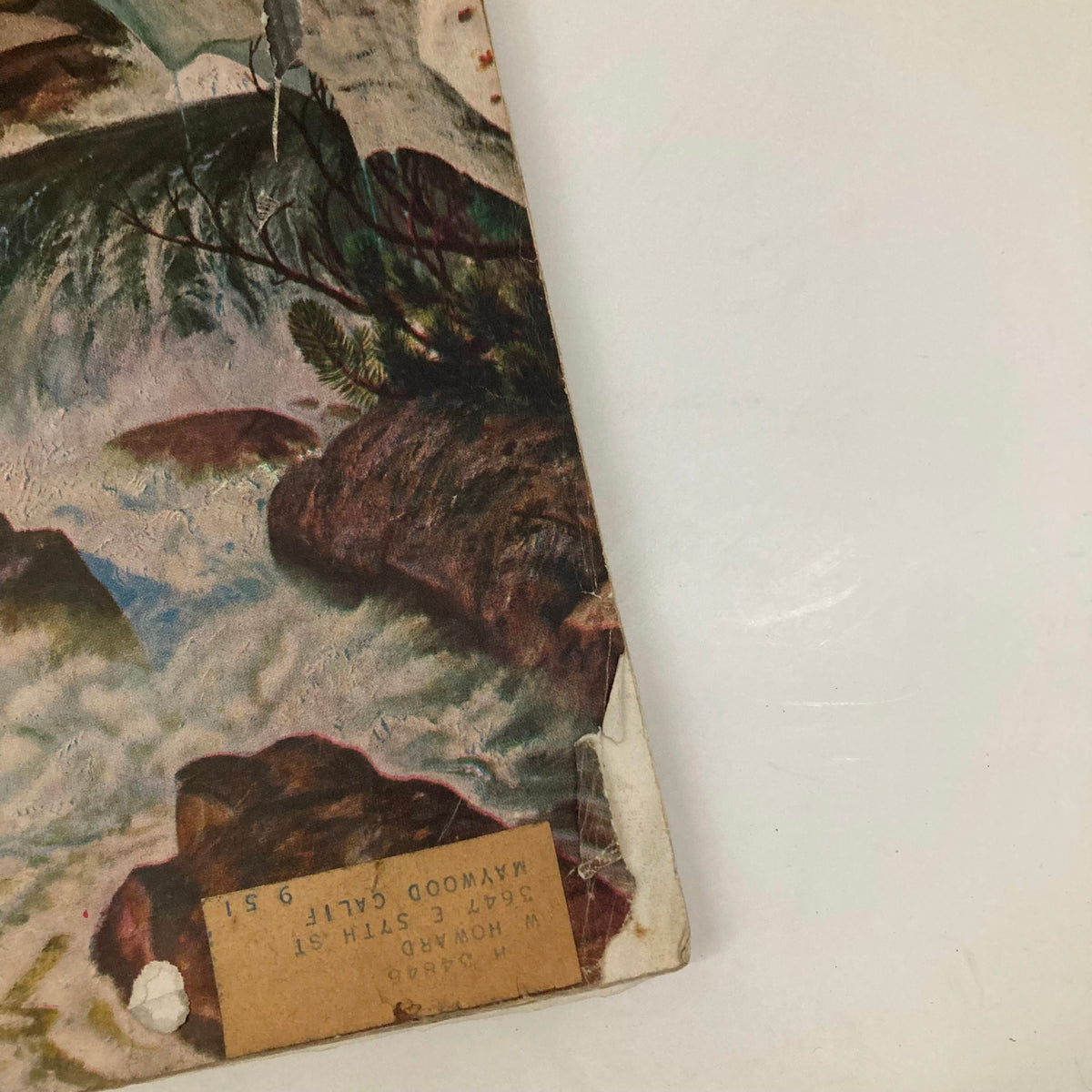 Detailed side view of the Saturday Evening Post Magazine from April 15, 1950 illustrating the Teanaway Canyon artwork by John Clymer, highlighting the artistry and vibrant colors of the natural scene.