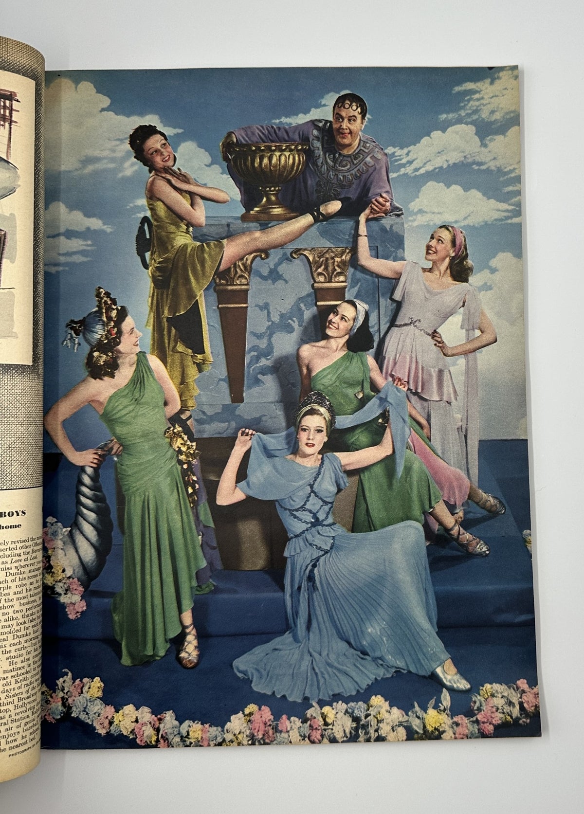 Esquire Magazine September 1944 showcases a vibrant scene with six women in elegant dresses posing theatrically, emphasizing vintage fashion and performance.