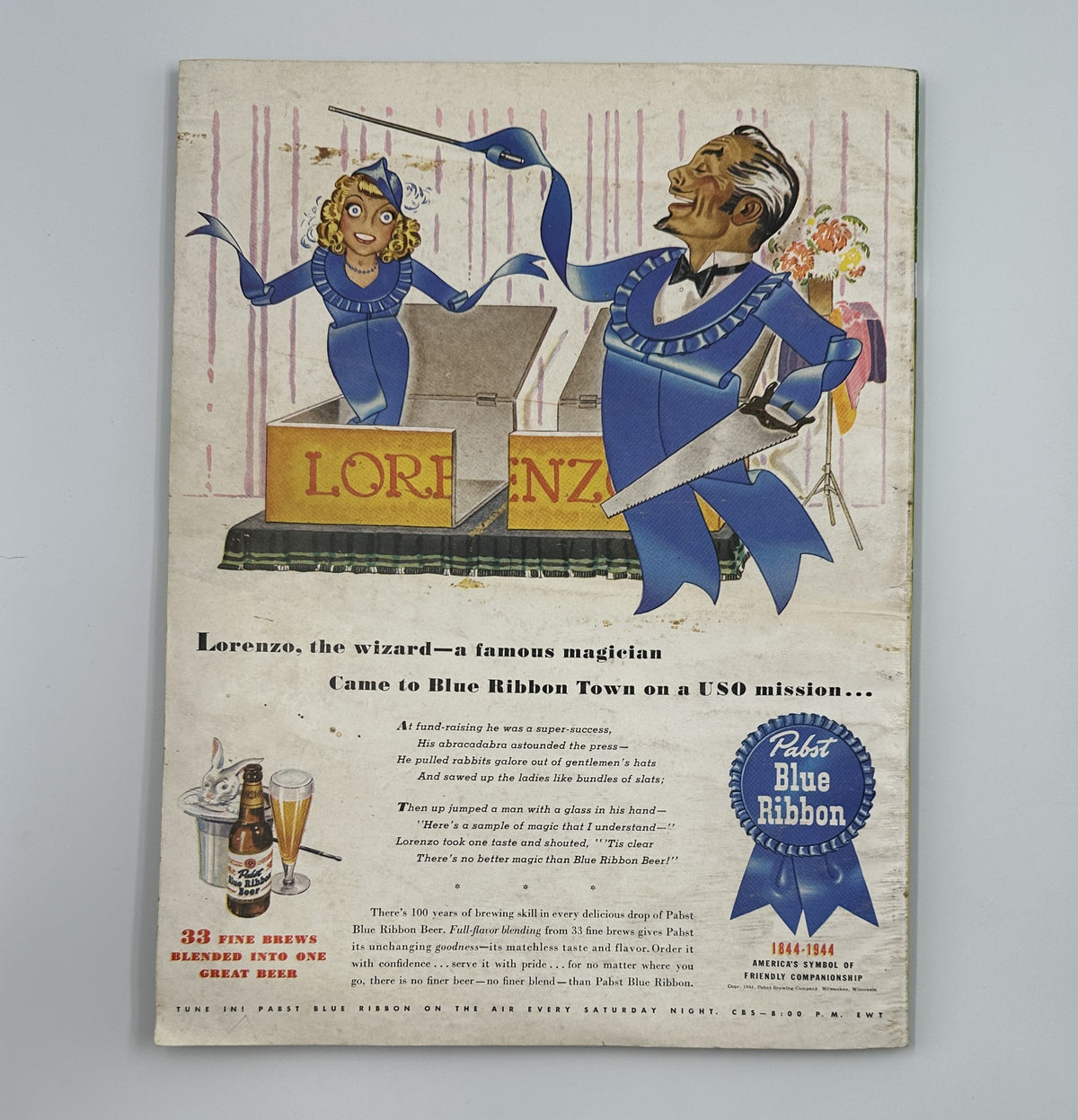 Esquire Magazine September 1944 displays an advertisement for Pabst Blue Ribbon featuring a magician named Lorenzo, promoting a fun-filled event with whimsical flair.