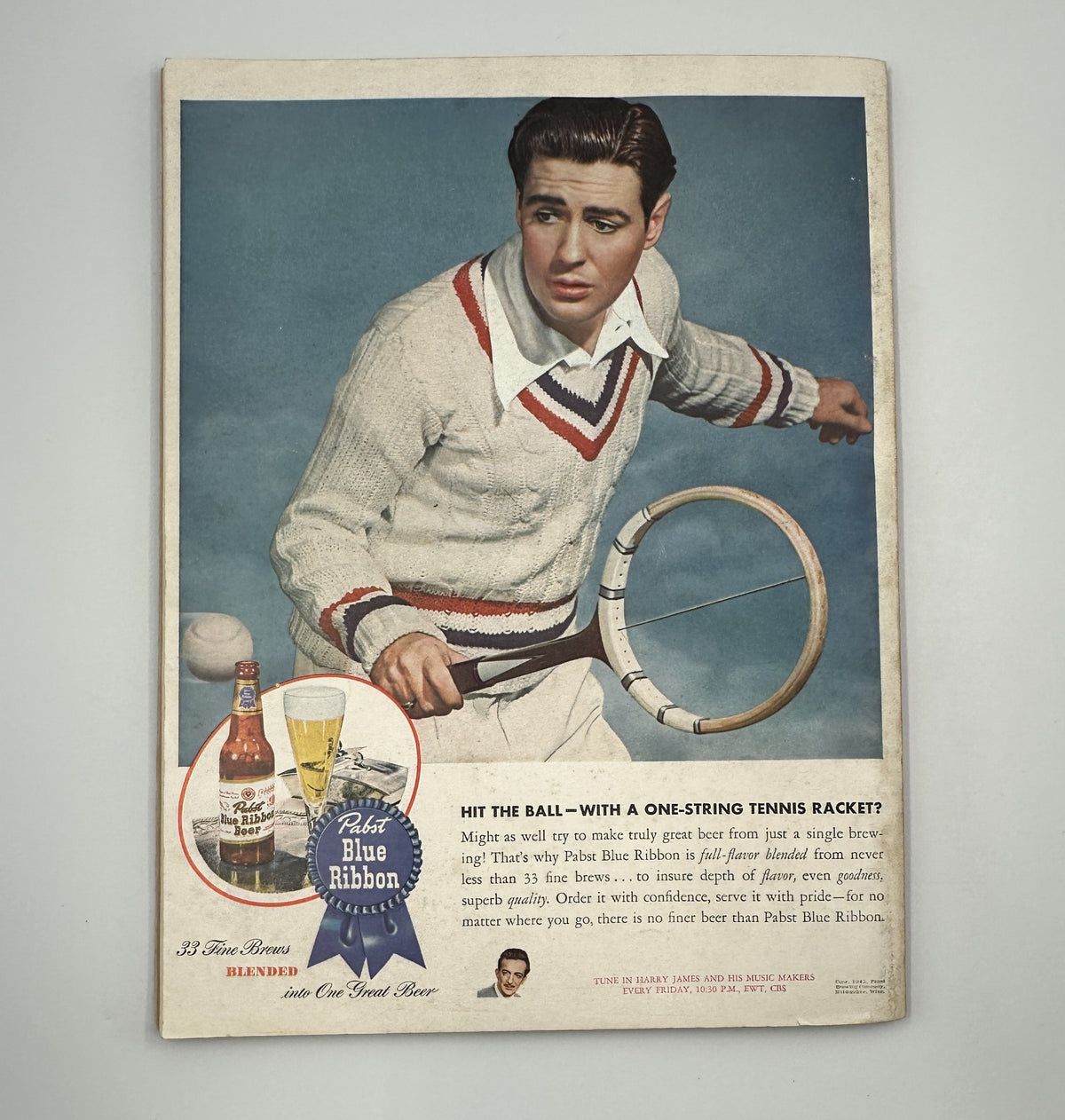 Esquire Magazine July 1945 cover featuring a man in a white tennis sweater with a racket, promoting Pabst Blue Ribbon beer with a stylish retro design.