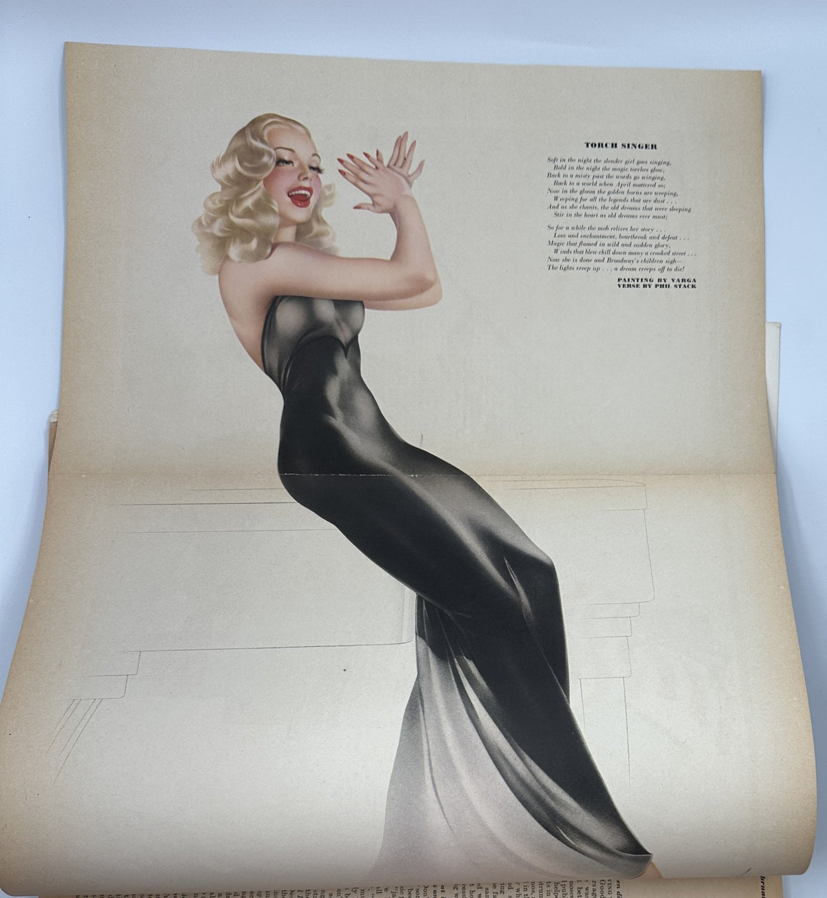 Esquire Magazine February 1944 Jazz Number showcasing a Varga foldout of a glamorous torch singer in an elegant black dress.