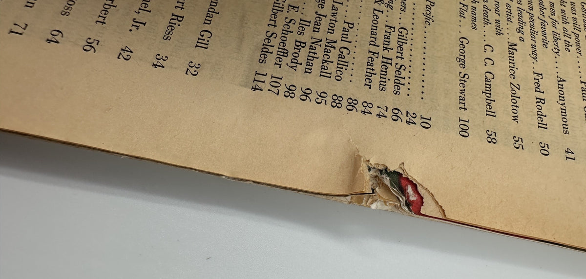 Close-up image of a damaged page from March 1945 Esquire Magazine, revealing a tear along the edge while listing article contributors.