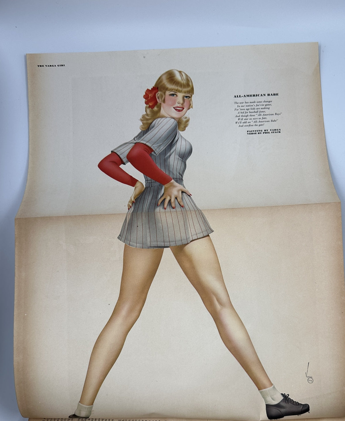 Foldout illustration from Esquire Magazine September 1944 showcasing a pinup girl in a playful outfit, highlighting classic pinup art by Varga.