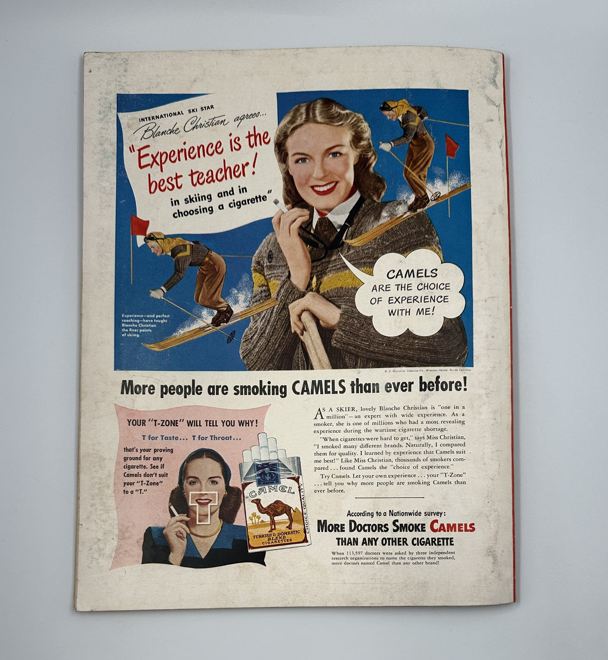 Esquire Magazine February 1948 showcasing a cigarette advertisement emphasizing that 'Experience is the best teacher' with a woman and ski sport theme.