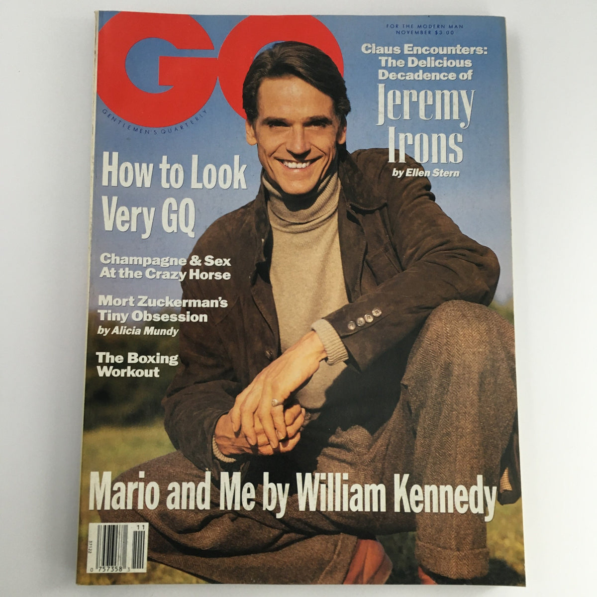 GQ Magazine November 1990 featuring Jeremy Irons on the cover, showcasing articles about fashion and culture, including 'How to Look Very GQ' and 'Claus Encounters: The Delicious Decadence of Jeremy Irons by Ellen Stern.' Vintage magazine aesthetics.