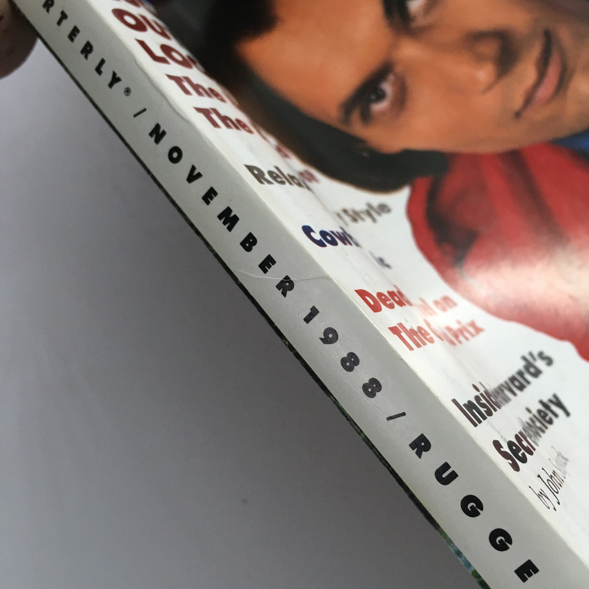 Side view of GQ Magazine November 1988 showing the month and year along with text about rugged outdoor looks and other features, emphasizing its vintage appeal.
