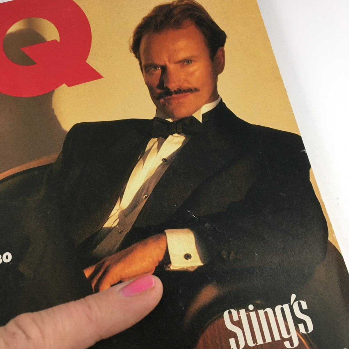 Detailed view of the GQ Magazine December 1989 cover with Sting, elegant attire emphasized in the featured title 'Sting's New Stage'.