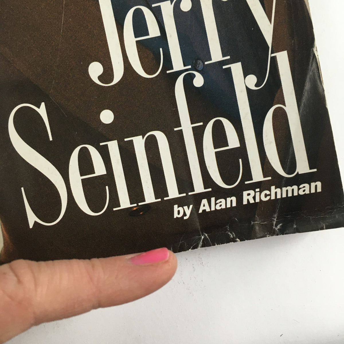 Close-up of the GQ Magazine title featuring Jerry Seinfeld, from the May 1992 issue, showcasing vintage design elements.