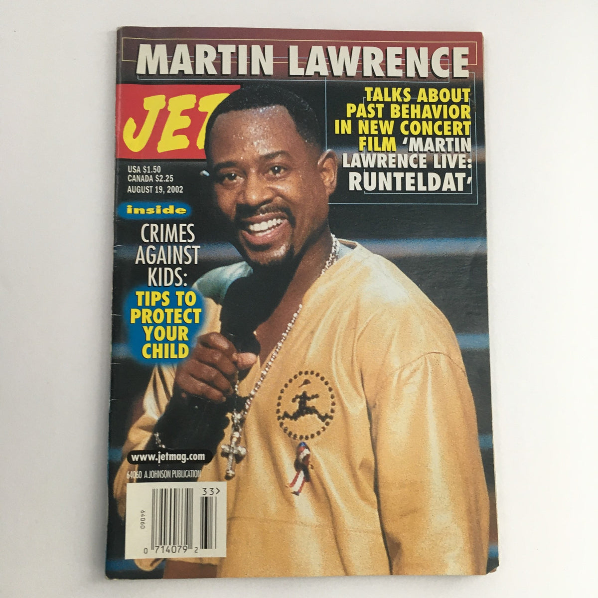 Cover of Jet Magazine from August 19, 2002 featuring Martin Lawrence discussing his past behavior at a concert. The magazine showcases vibrant colors and headlines, with a photo of Martin Lawrence smiling and dressed in a casual outfit.
