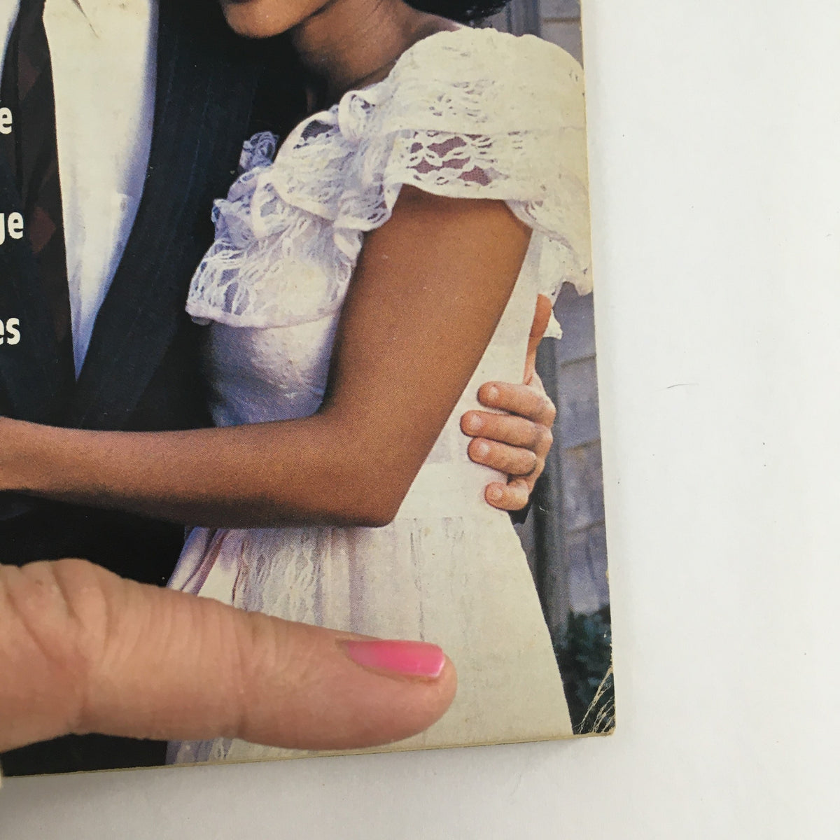 Close-up of the Jet Magazine cover featuring Lela Rochon and Timothy Hutton, focusing on their intertwined hands and elegant attire, from April 8, 1996.