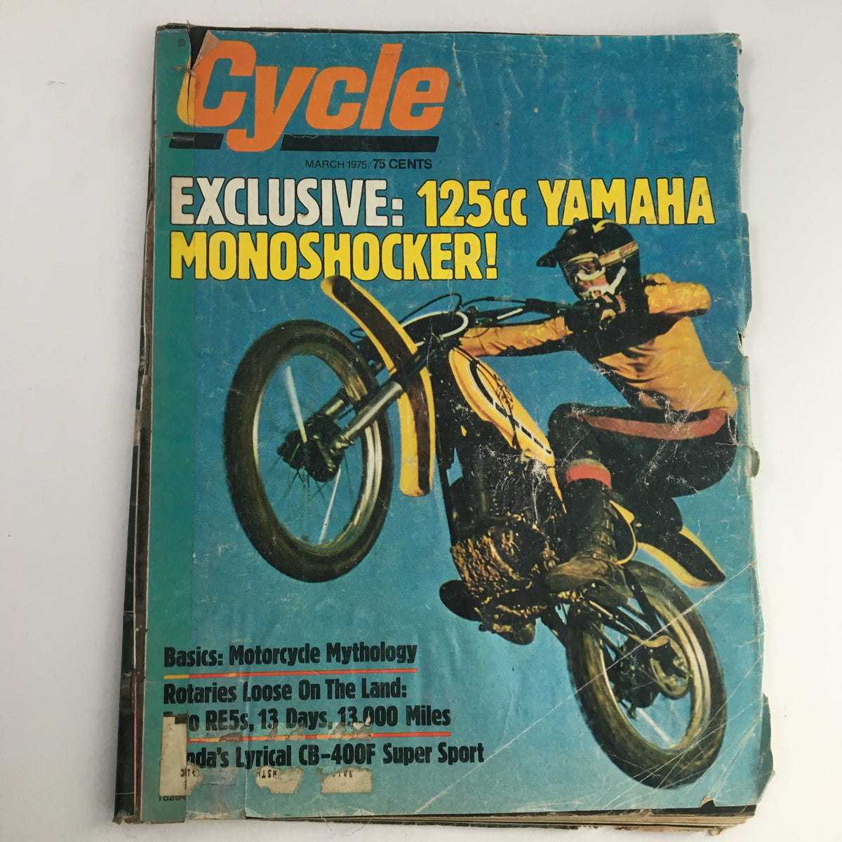 Cycle Magazine March 1975 featuring an exclusive article on the 125cc Yamaha Monoshocker with an action shot of a rider on a motorcycle, showcasing vintage motorcycle culture.