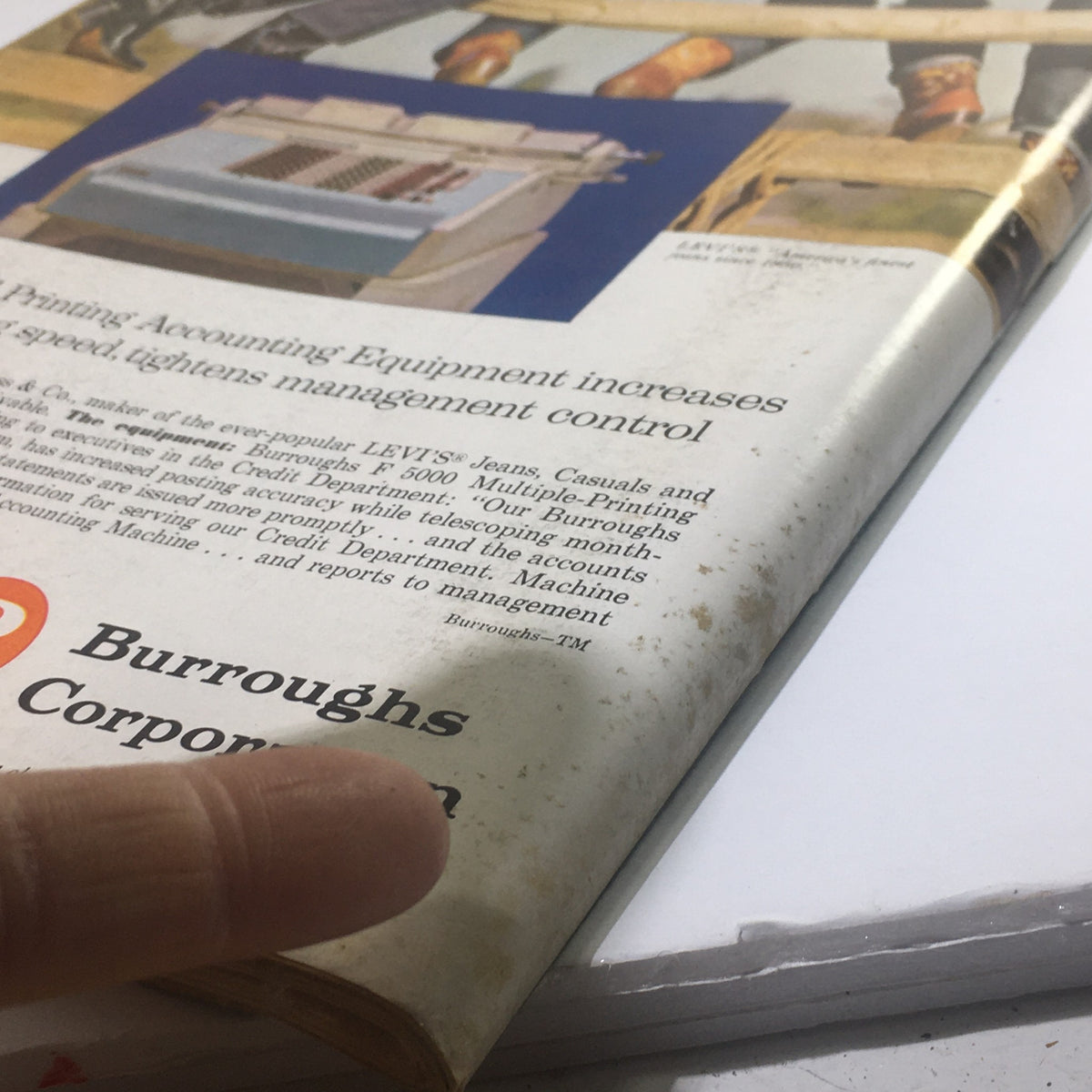 Close-up of Business Week Magazine from September 23 1961, featuring an advertisement for Burroughs Corporation's Accounting Equipment, showcasing printing technology that enhances management control, reflecting the era's advancements in computer software and work efficiency.