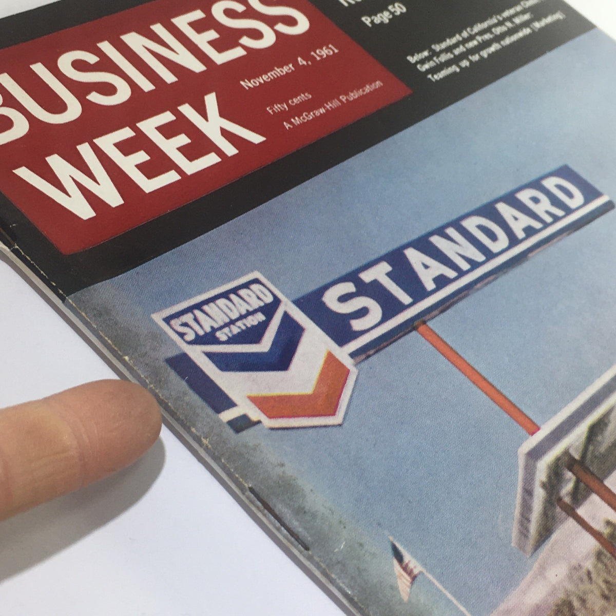 Close-up view of the cover of Business Week Magazine, November 4, 1961, highlighting the Standard Station sign and magazine details.