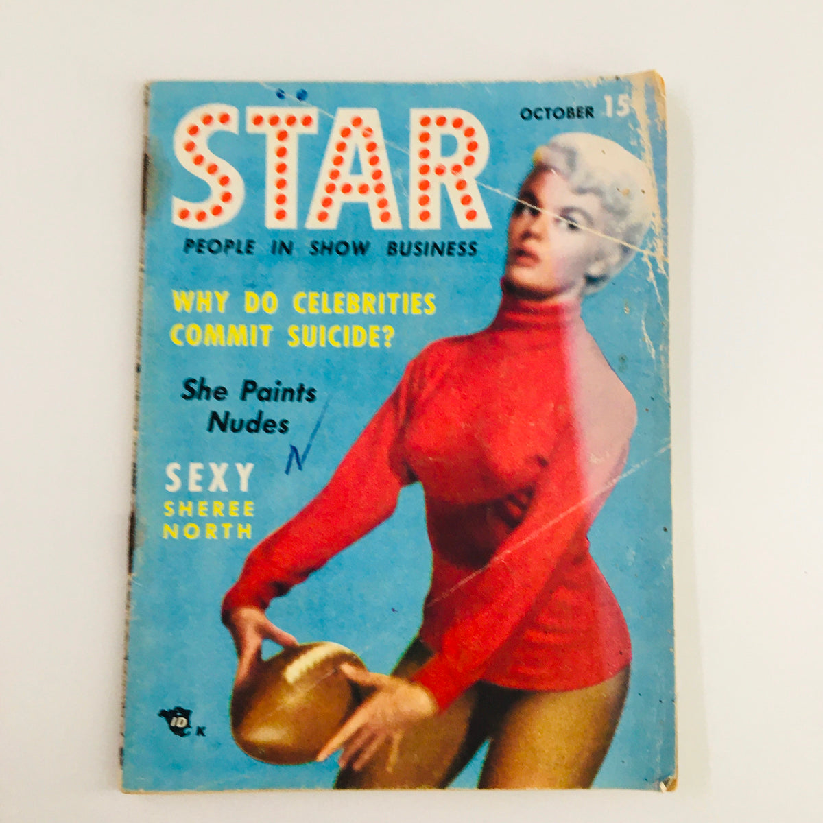 Star Tabloid Magazine October 1954 cover featuring a woman in a red turtleneck sweater and the headline 'Why Do Celebrities Commit Suicide?' with additional content about Sheree North and nude art.