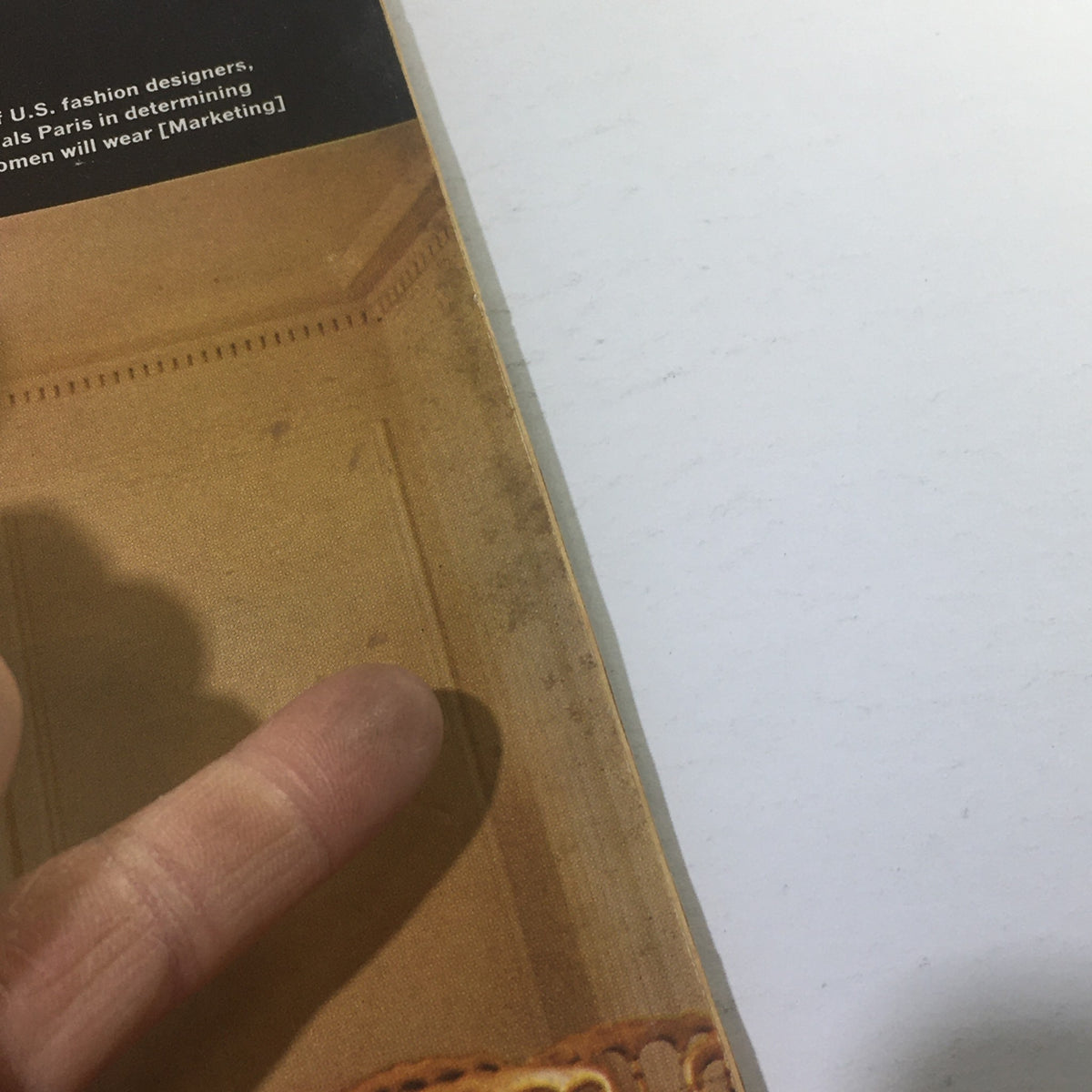 Detail of the spine of Business Week Magazine from September 12, 1964, highlighting the vintage condition and providing a glimpse into the magazine's content about Norman Norell and fashion.