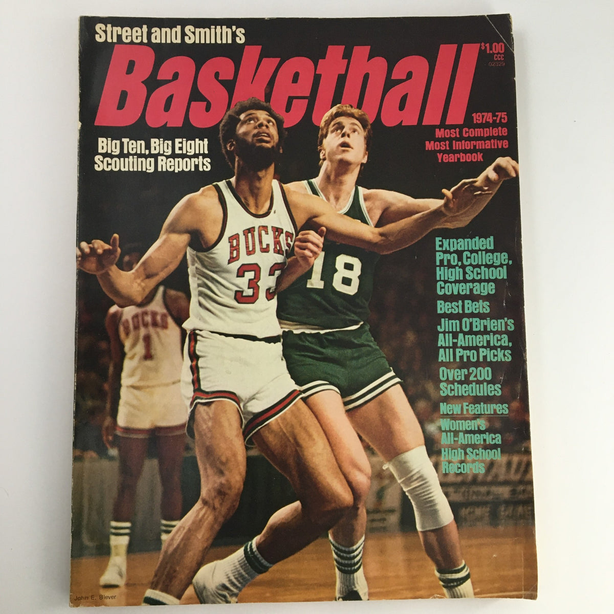 Cover of Street & Smith's College & Pro Basketball Yearbook 1974-75 featuring players in action and the title prominently displayed. A must-have for basketball fans and collectors.
