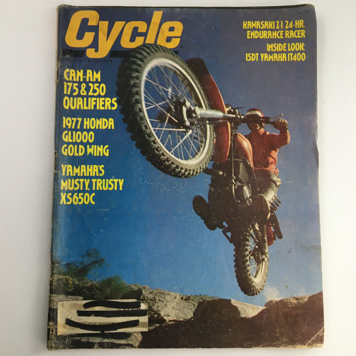 Cover of Cycle Magazine March 1977 featuring articles on Can-Am 175 & 250, Honda GL1000, and Yamaha XS650C. Image showcases a motorcycle in action, highlighting the excitement of vintage motorcycling.