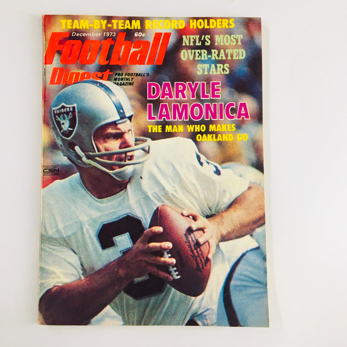 Football Digest Magazine December 1973 featuring Daryle Lamonica on the cover, showcasing the quarterback in action with the Oakland Raiders. A collectible issue for vintage magazine enthusiasts.