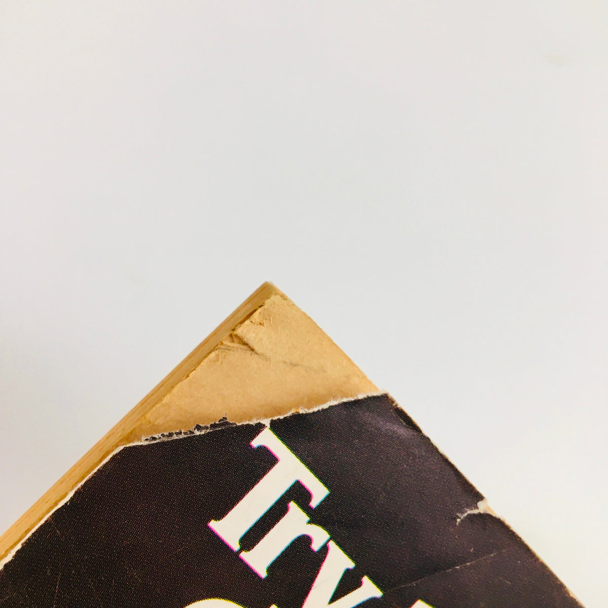 Close-up of the edge of the VTG Baseball Digest Magazine from March 1979, featuring visible wear and tear, including a torn corner, highlighting the vintage condition of the publication showcasing Greg Luzinski, 'The Phil's Power Man'.